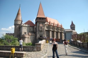 RomanianCastleWithLizz The castle we stopped at with Lizz posing before it