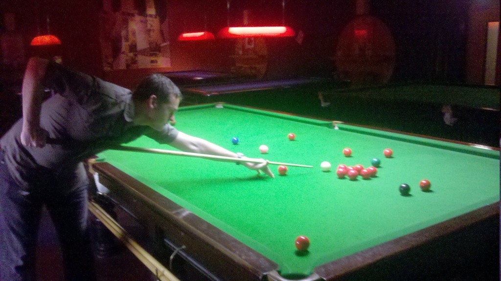 Adam playing snooker